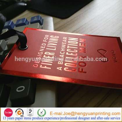 Red foil stamp logo paper hang tag with string and metal eyelet